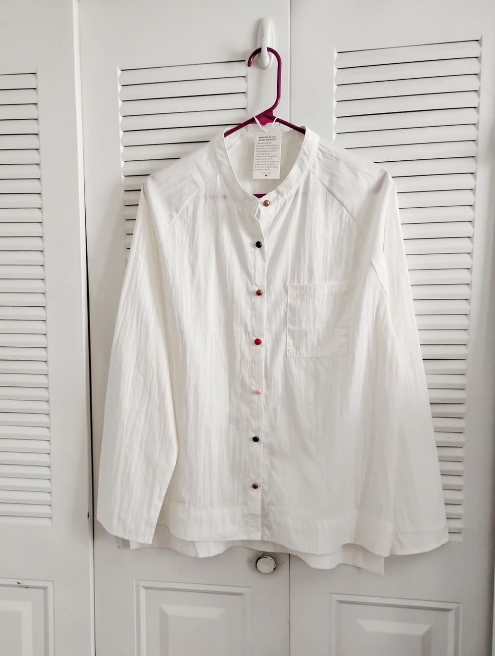 White Button-Up Shirt with Multicolor Buttons